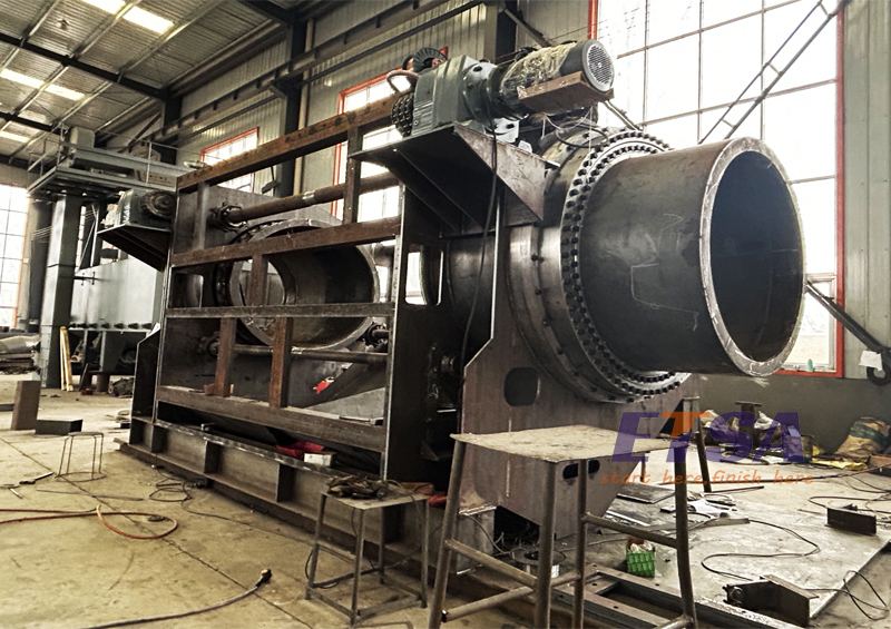 Continuous Tumble Blaster Shot Blasting Machine with Steel Belt in Production